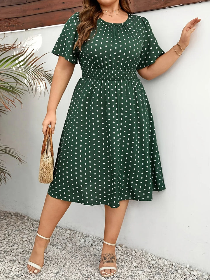 Dames jurk | Groene stippen jurk met elastische taille
