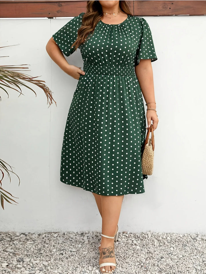 Dames jurk | Groene stippen jurk met elastische taille
