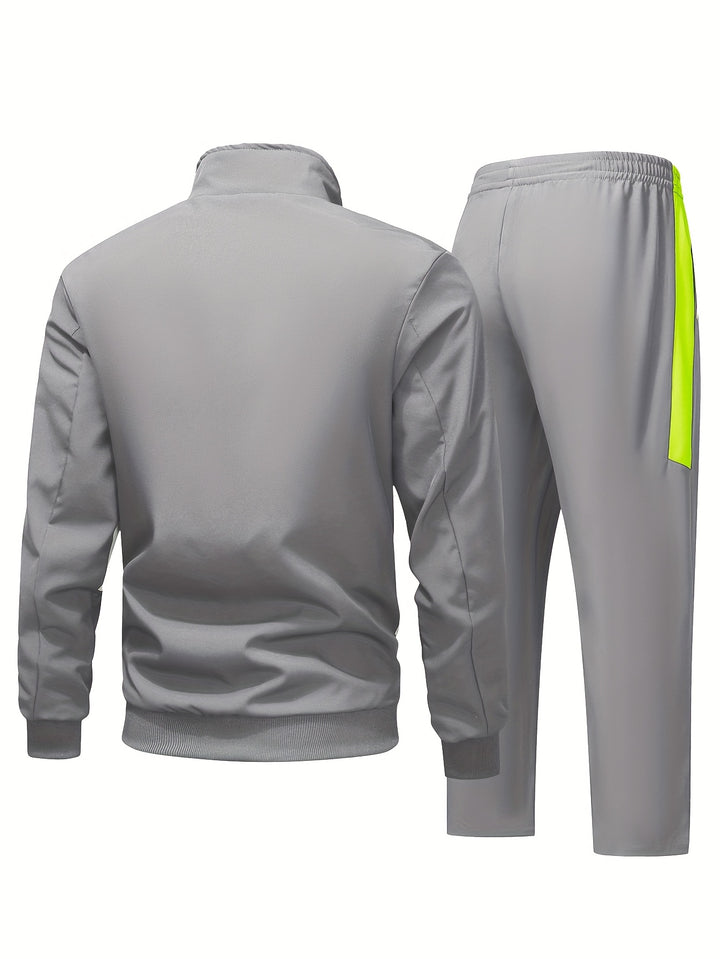 Heren trainingspak | Zwart sportpak met neon rits en broek