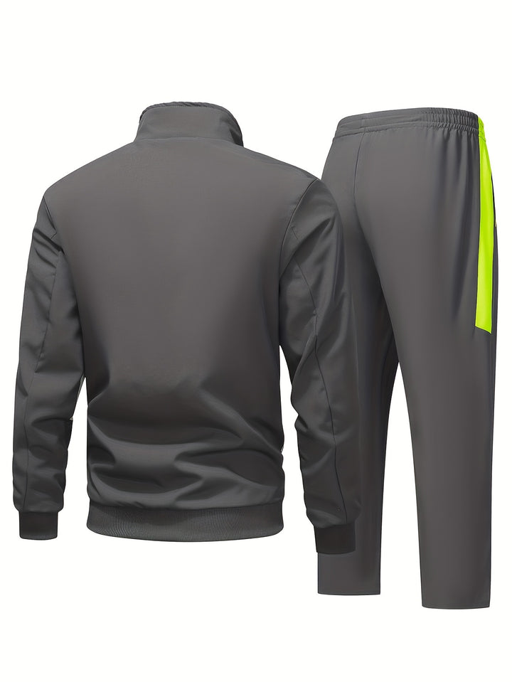 Heren trainingspak | Zwart sportpak met neon rits en broek