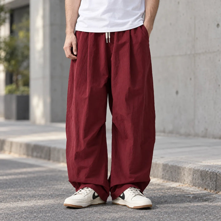 Baggy parachutebroek heren | Wijde broek met elastische tailleband