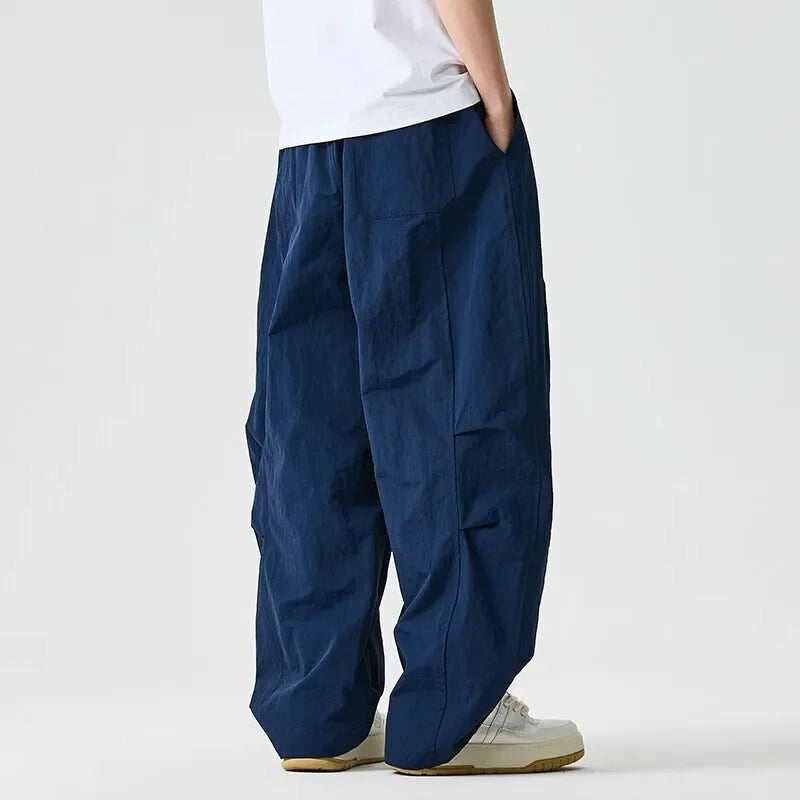 Baggy parachutebroek heren | Wijde broek met elastische tailleband