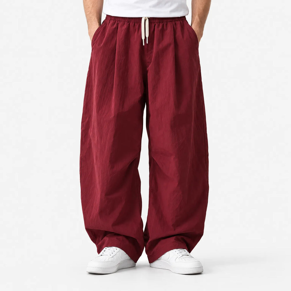 Baggy parachutebroek heren | Wijde broek met elastische tailleband
