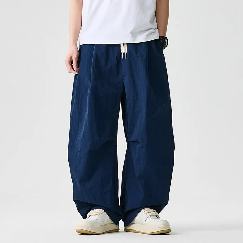 Baggy parachutebroek heren | Wijde broek met elastische tailleband