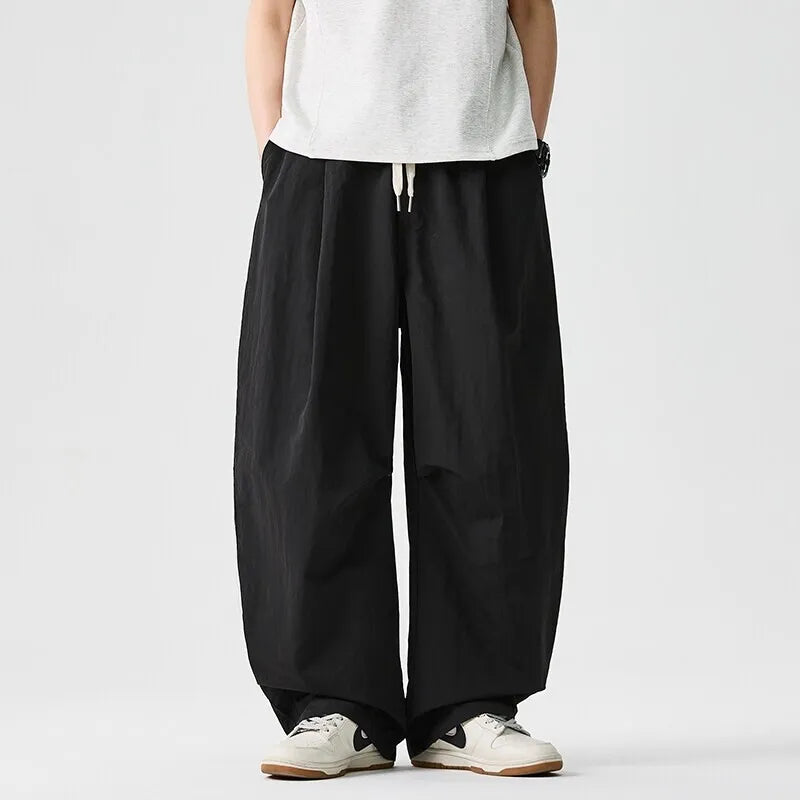 Baggy parachutebroek heren | Wijde broek met elastische tailleband