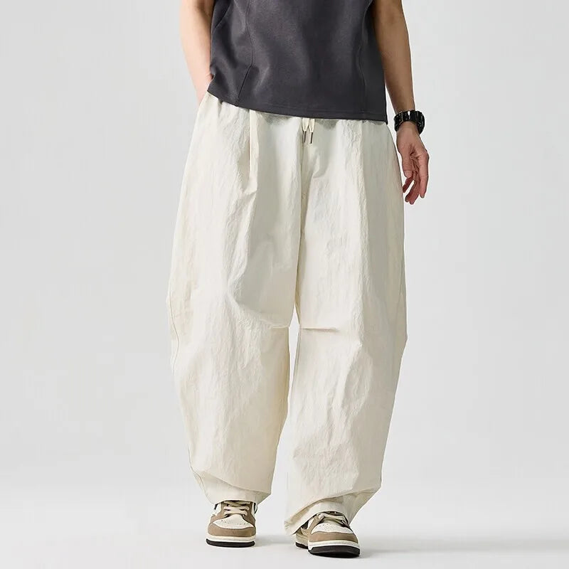 Baggy parachutebroek heren | Wijde broek met elastische tailleband