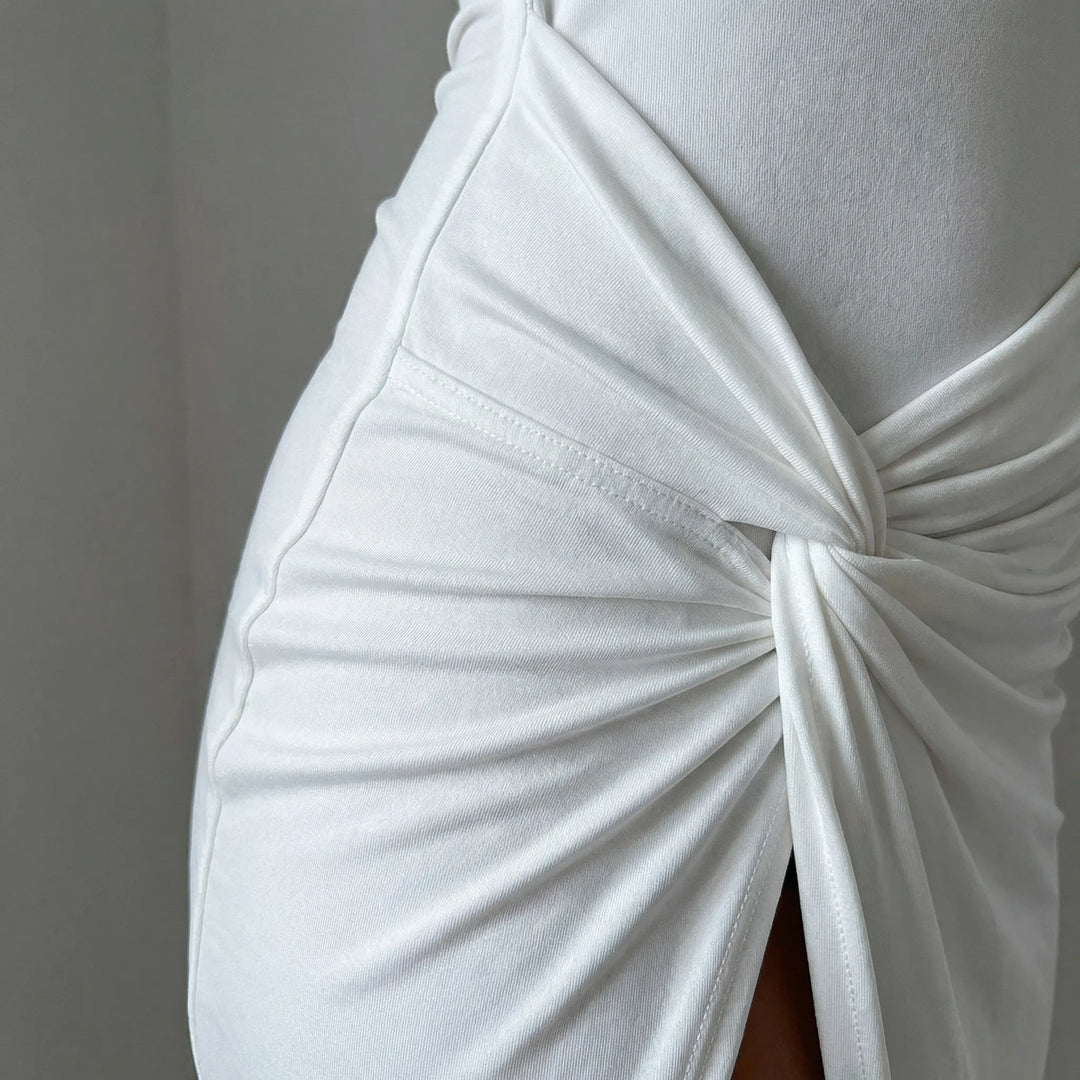 Dames avondjurk | Lange jurk met cut-out, split en lange mouw