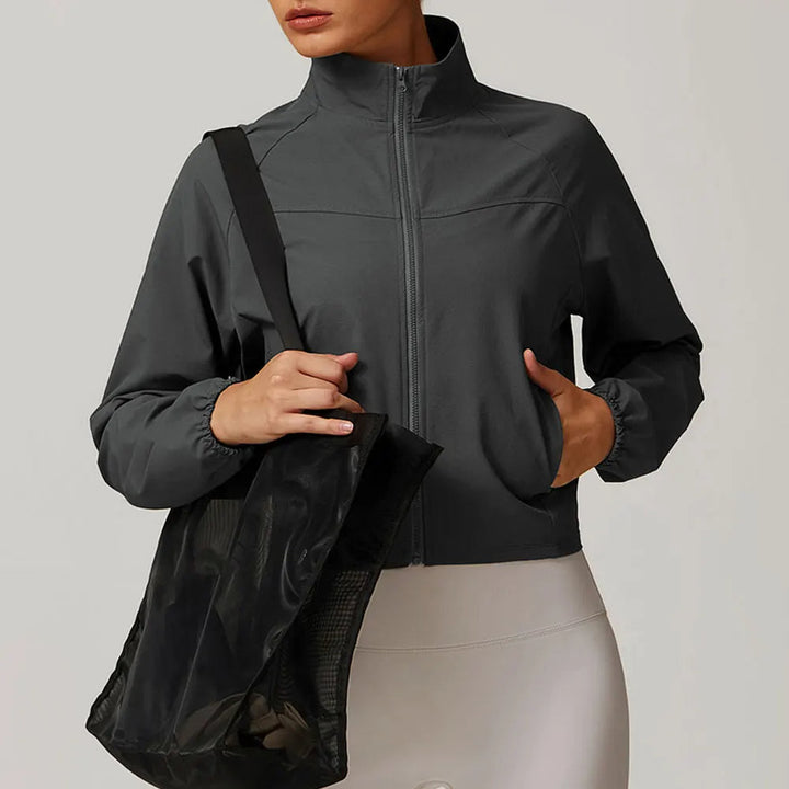 Dames jack | Sportief kort model met hoge kraag en rits