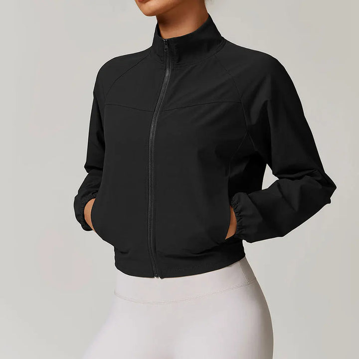 Dames jack | Sportief kort model met hoge kraag en rits