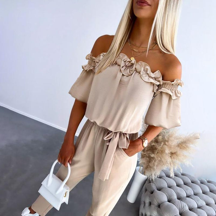 Dames jumpsuit met korte mouwen | off-shoulder hals en strikceintuur