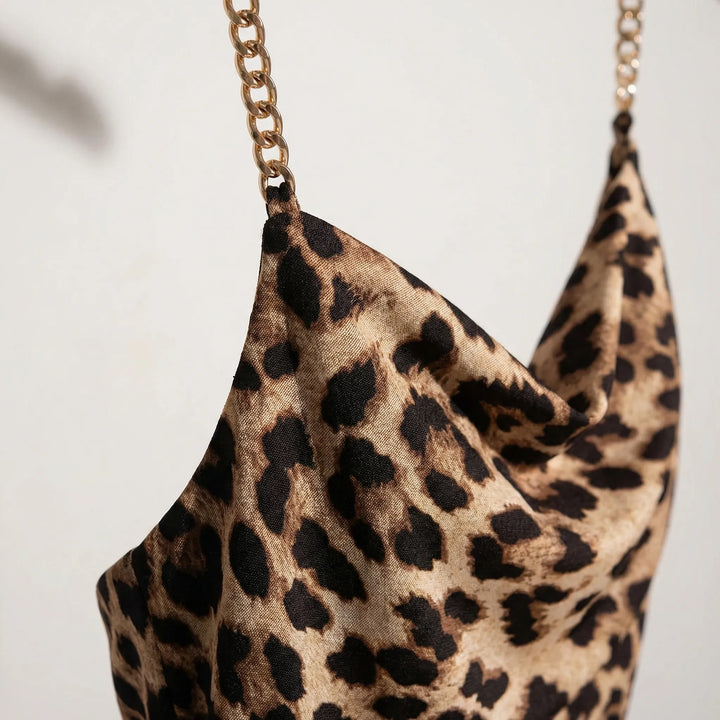 Dames maxi jurk | Luipaard jurk met halter, split en open rug