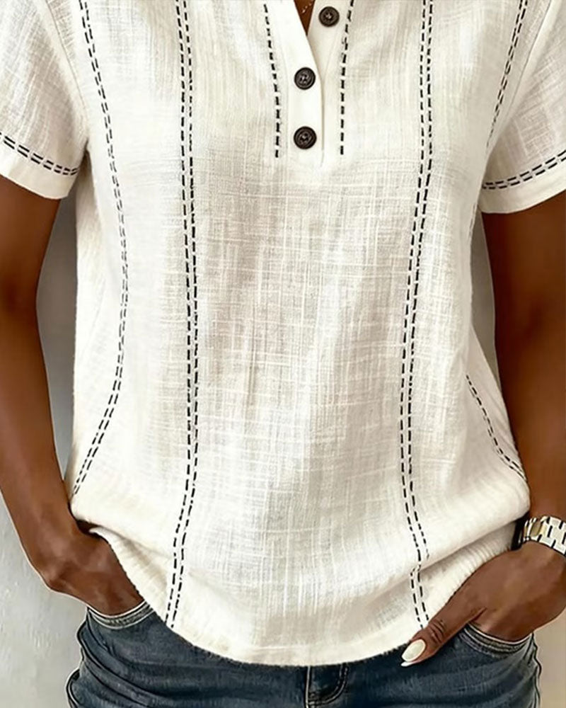 Dames top | Blouse met korte mouwen en knoopdetails