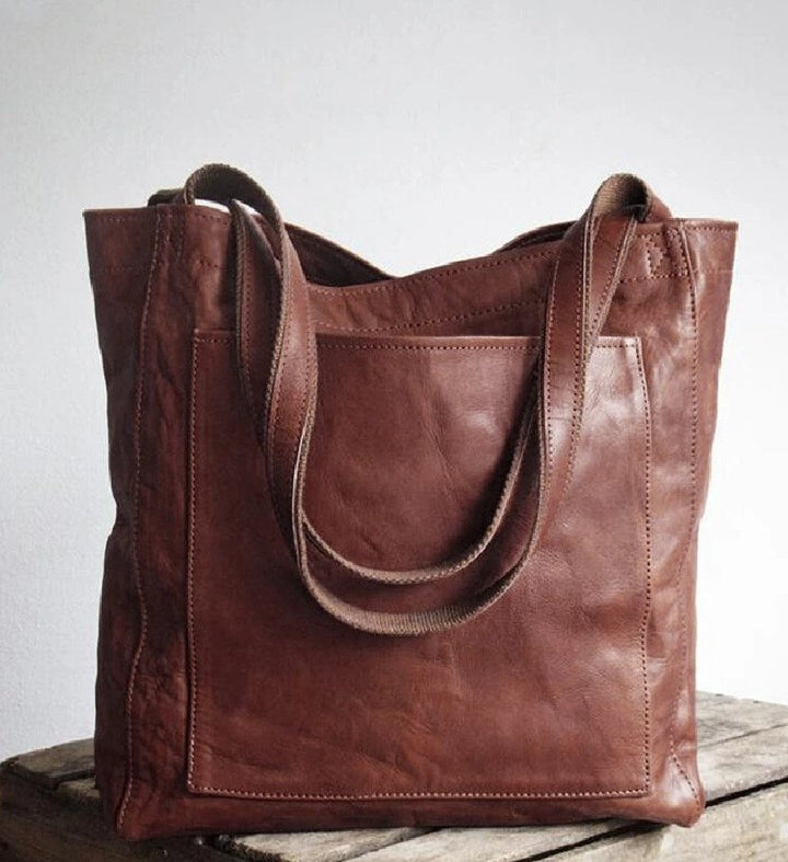 Damestas | Schoudertas van leerlook met ritsvakken