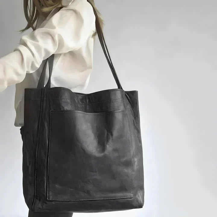 Damestas | Schoudertas van leerlook met ritsvakken