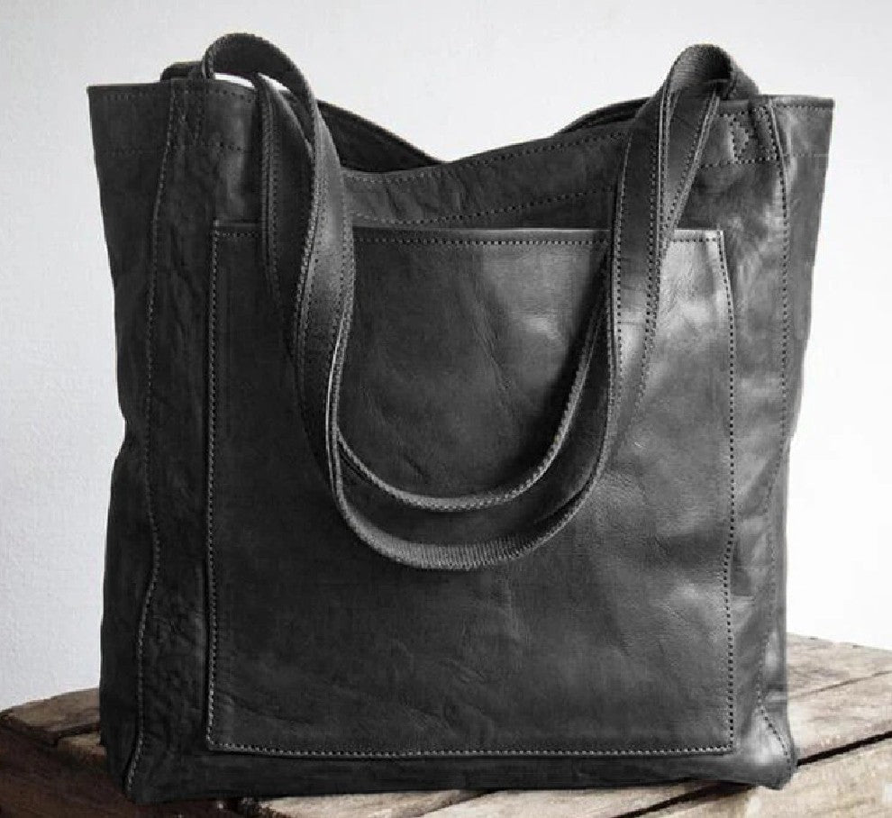 Damestas | Schoudertas van leerlook met ritsvakken
