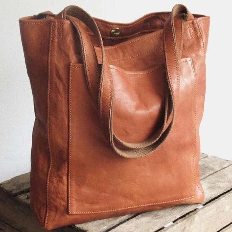 Damestas | Schoudertas van leerlook met ritsvakken