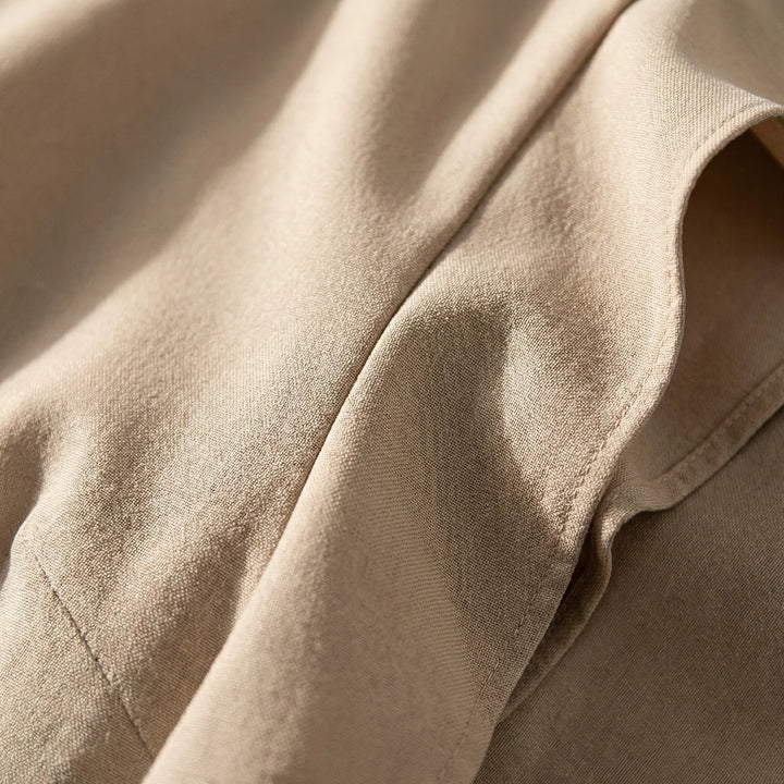 Elegante jumpsuit dames met strikceintuur | Wijde pijpen