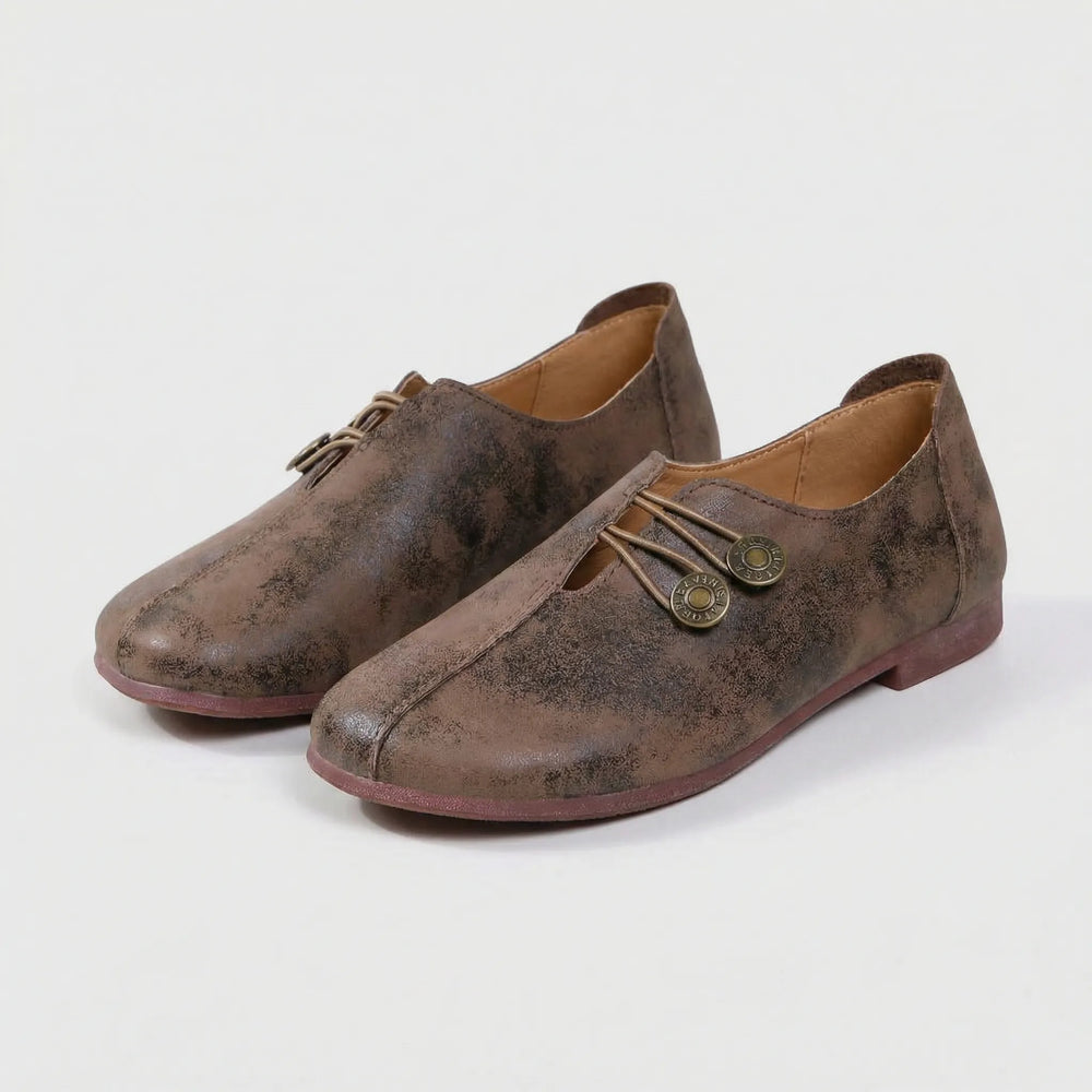 Instappers dames | Platte schoenen met knoopdetail