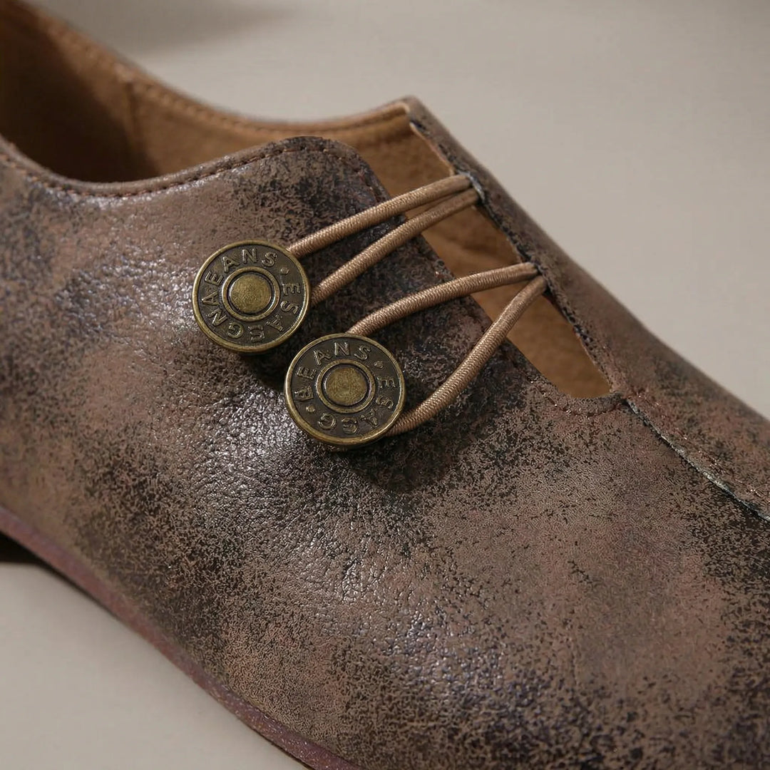 Instappers dames | Platte schoenen met knoopdetail