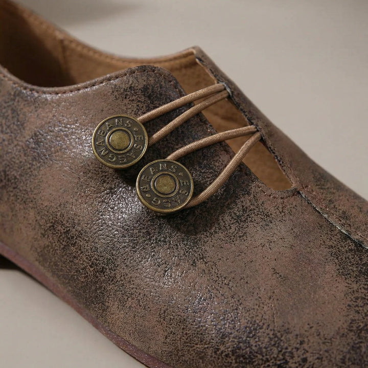 Instappers dames | Platte schoenen met knoopdetail
