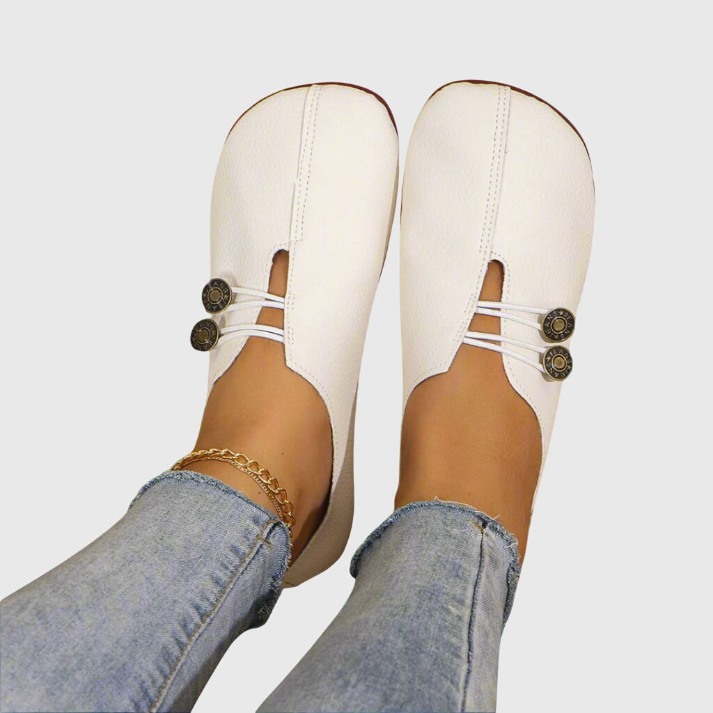 Instappers dames | Platte schoenen met knoopdetail