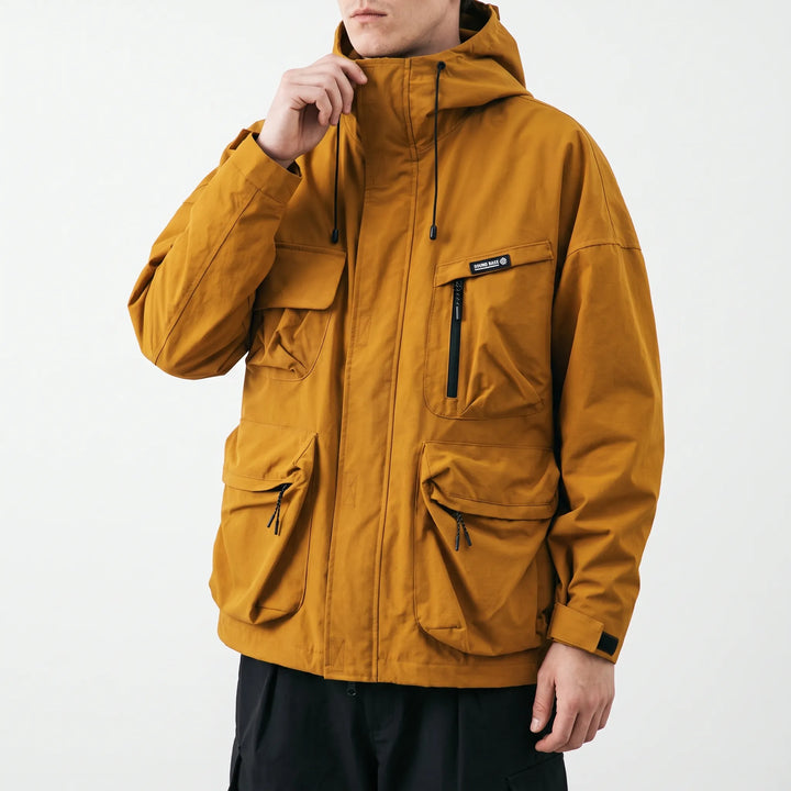 Jas heren | Outdoor jas met capuchon en cargozakken