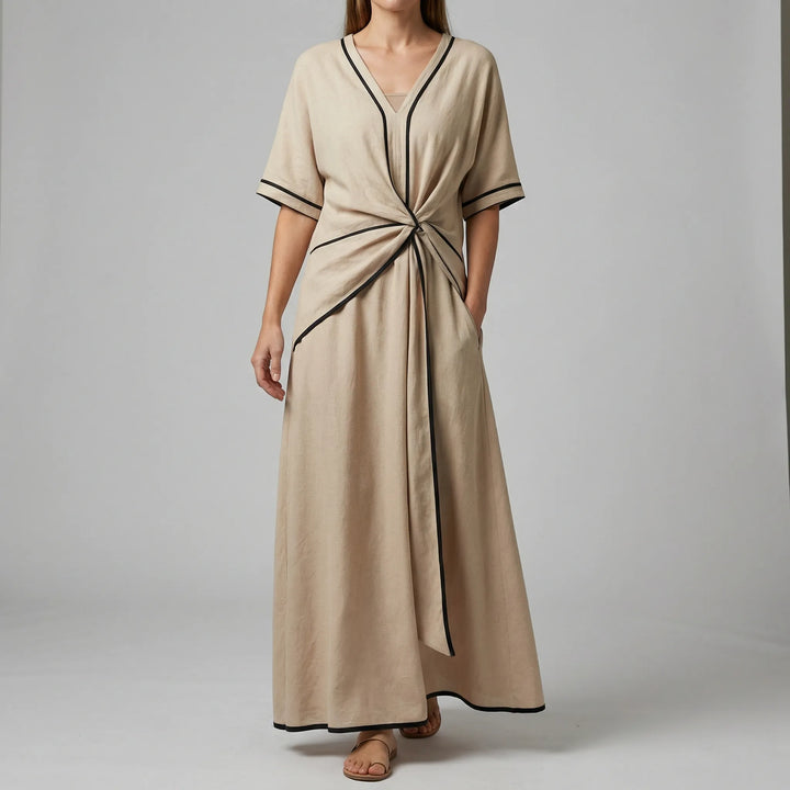 Maxi jurk dames | Elegante zomerjurk met v-hals en knoopdetail