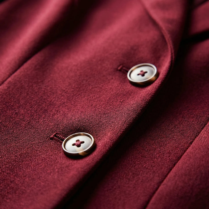 Midi jurk dames | Getailleerde overslag jurk met knopen en lange mouw