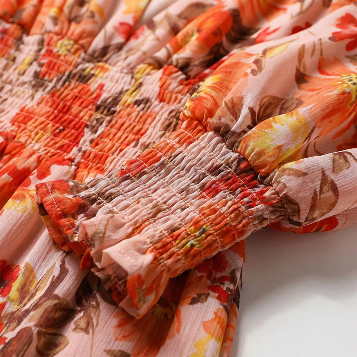 Midi jurk dames | Smock jurk met bloemenprint en lange mouw