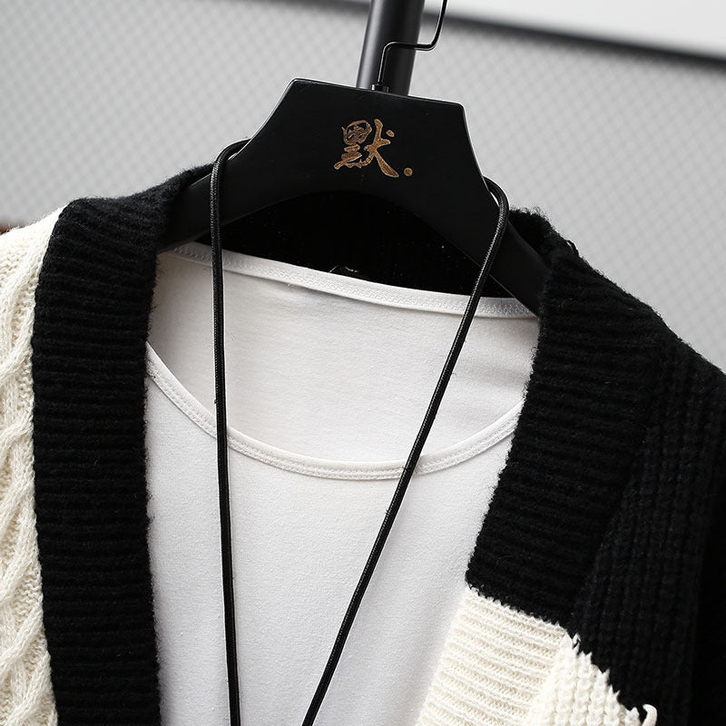 UrbanPatch | Kabel‑patchwork vest met toggle‑sluiting