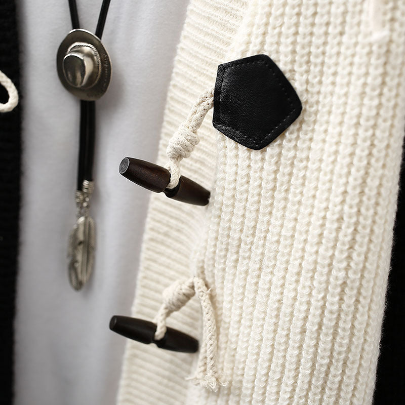 UrbanPatch | Kabel‑patchwork vest met toggle‑sluiting