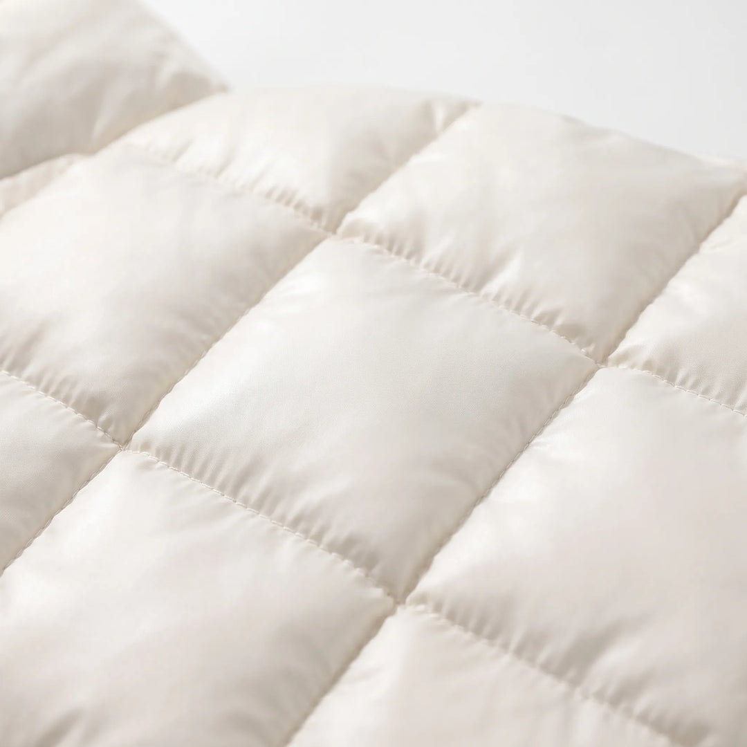 Puffer jas dames | Lange gewatteerde jas met capuchon en ceintuur