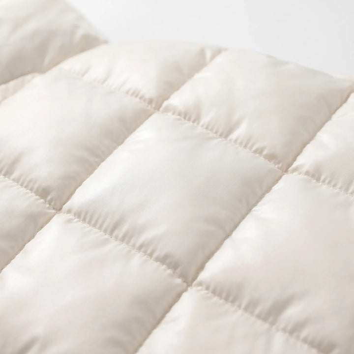 Puffer jas dames | Lange gewatteerde jas met capuchon en ceintuur