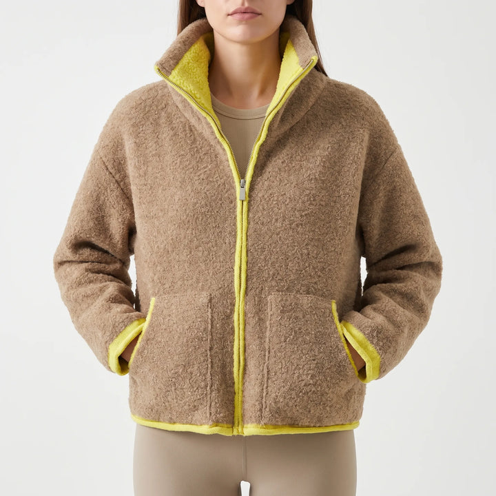Teddy jas dames | Sportief model met contrastbies en rits