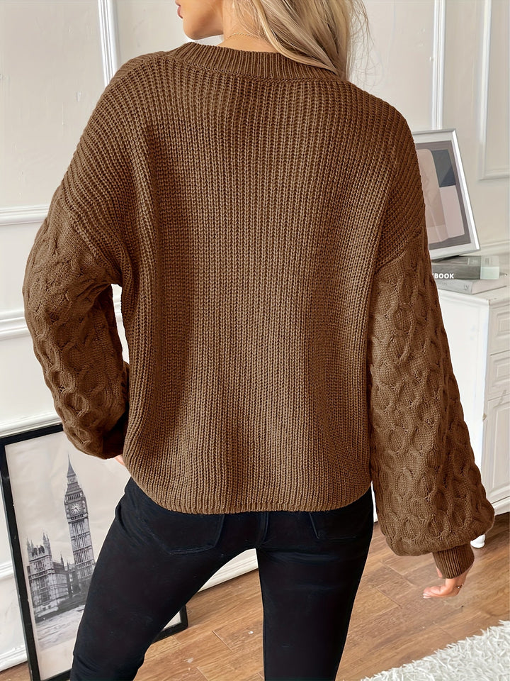 Trui dames | Grofgebreid model met kabelmouwen en ronde hals