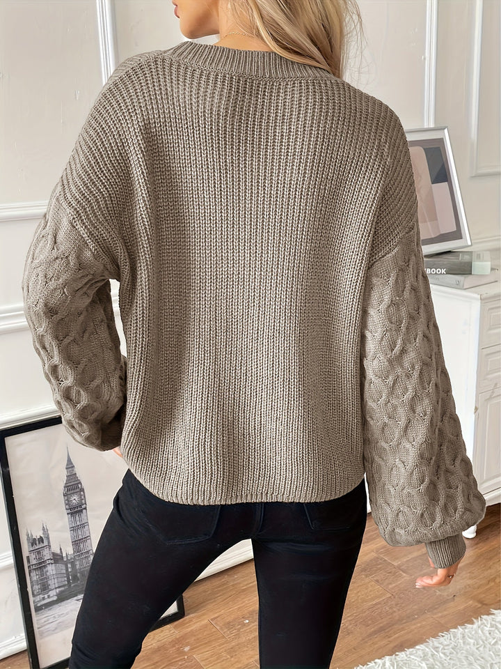 Trui dames | Grofgebreid model met kabelmouwen en ronde hals