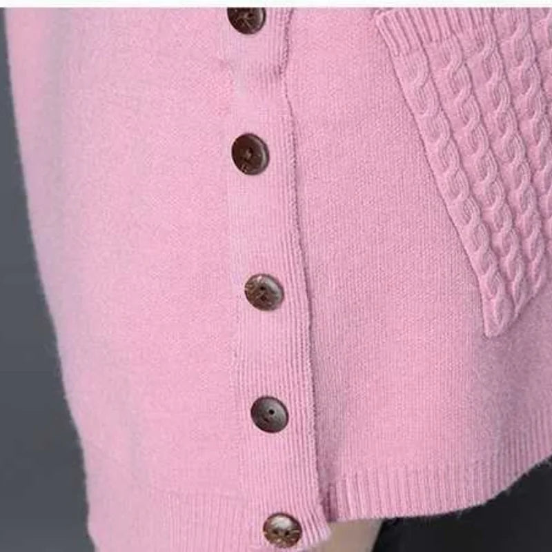 Trui dames | Lang gebreid model met ronde hals en zakken