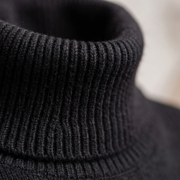 Trui dames | Oversized coltrui met knoopdetails aan mouwen