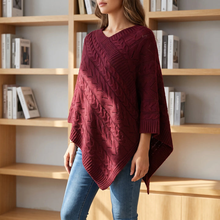 Trui dames | Oversized poncho met kabelpatroon en v-hals