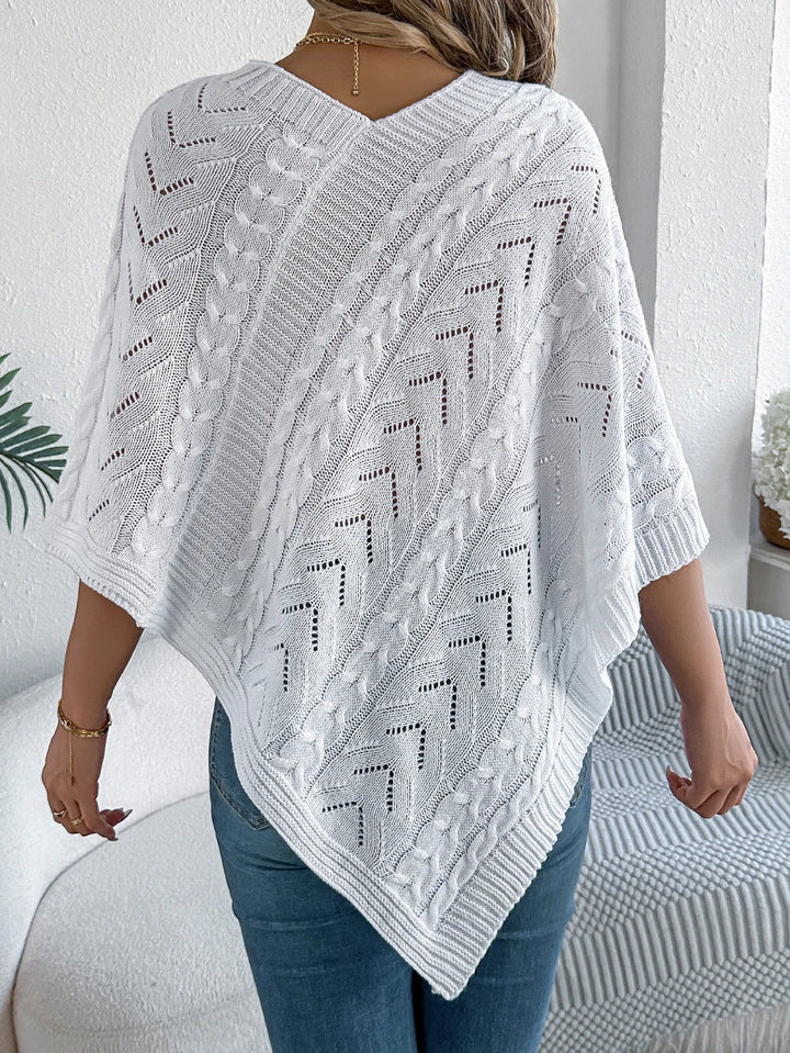 Trui dames | Oversized poncho met kabelpatroon en v-hals