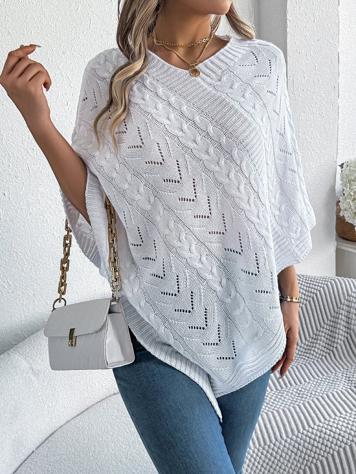 Trui dames | Oversized poncho met kabelpatroon en v-hals