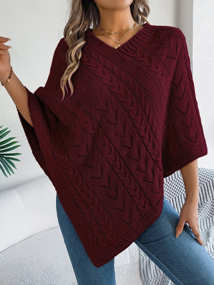 Trui dames | Oversized poncho met kabelpatroon en v-hals