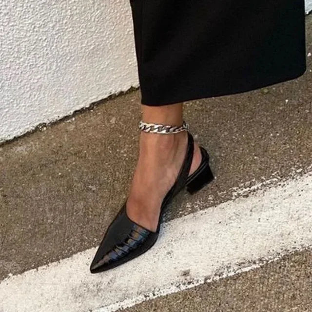 Elegante damespumps met comfortabele hak en tijdloze uitstraling