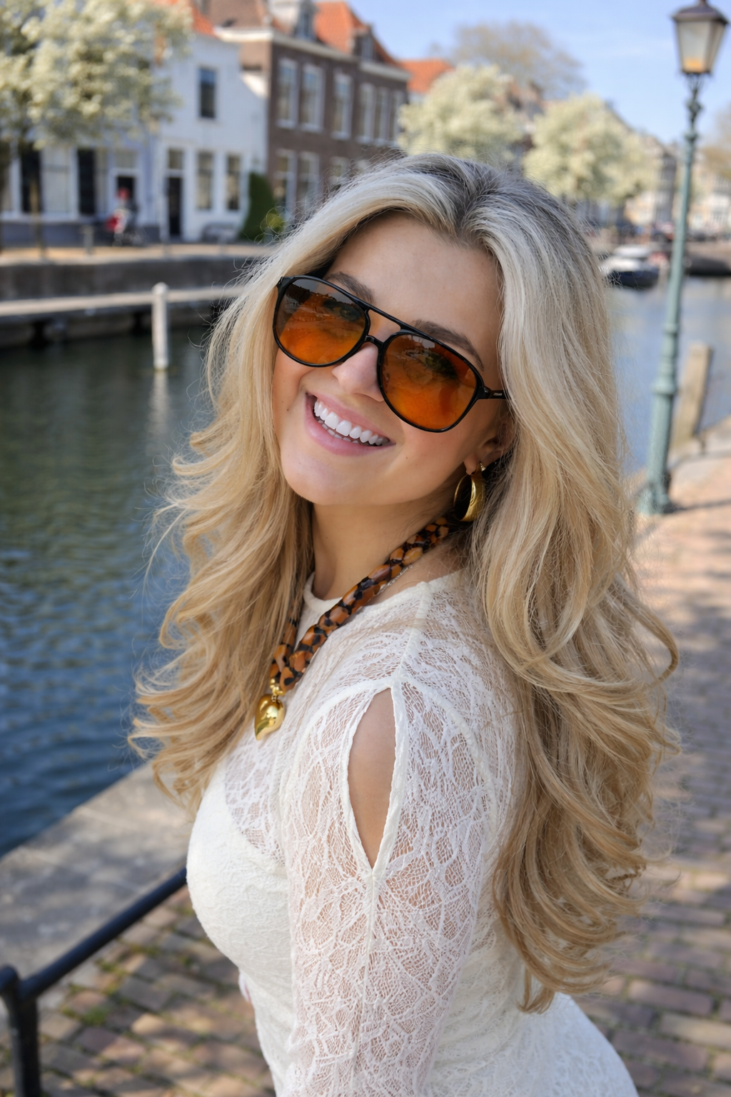 Zonnebril dames | Aviator stijl met oranje glazen