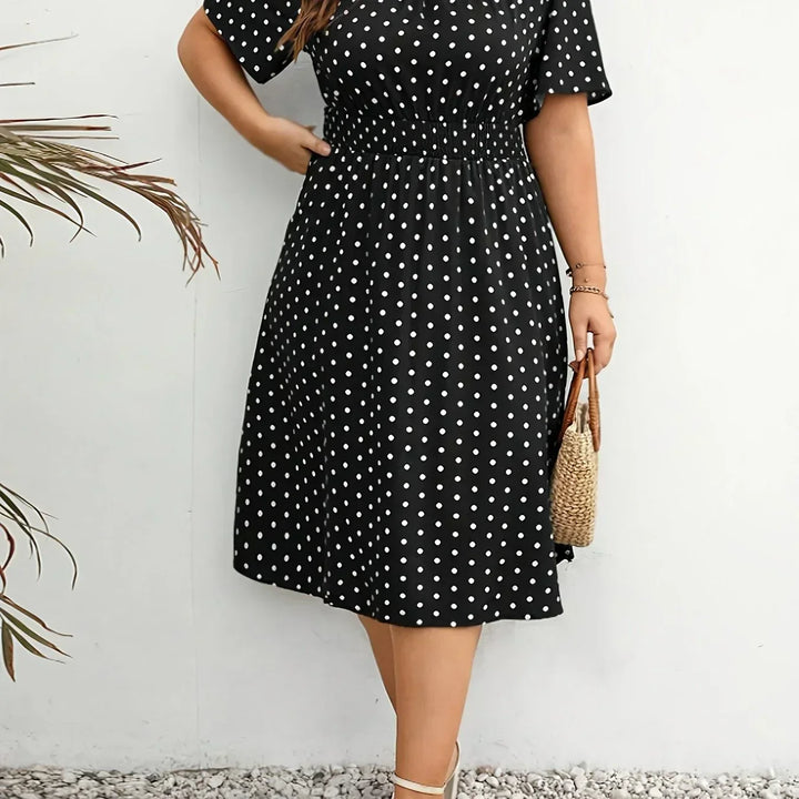 Dames jurk | Groene stippen jurk met elastische taille