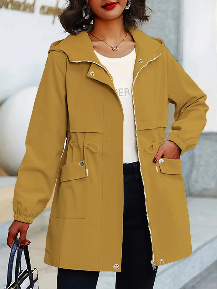 Dames trenchcoat | Beige windbreaker met capuchon en taillekoord