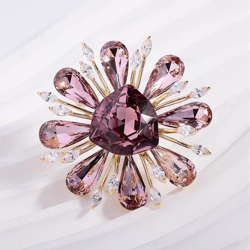 Broche dames | Stervormige broche met centrale steen