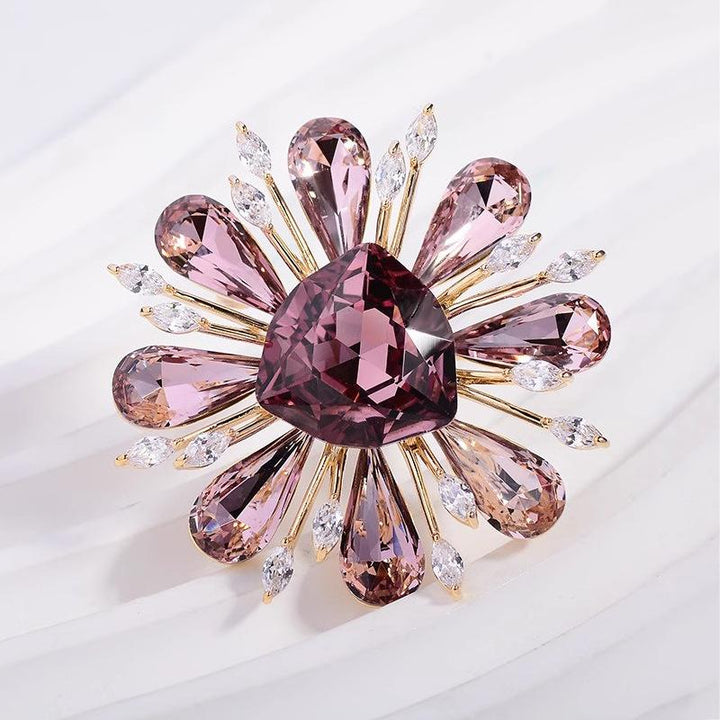 Broche dames | Stervormige broche met centrale steen