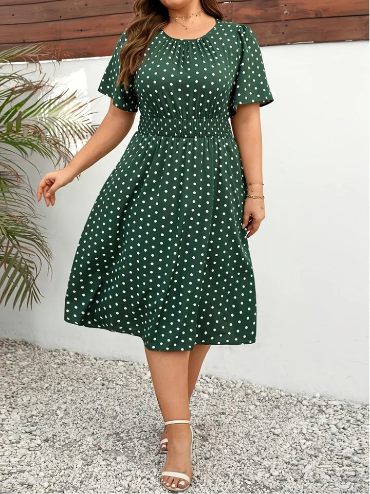 Dames jurk | Groene stippen jurk met elastische taille