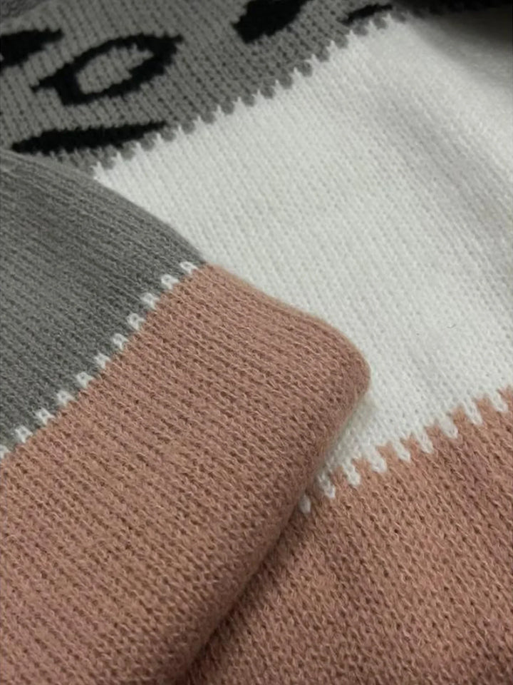 Dames trui | Gebreide sweater met panterprint en ronde hals